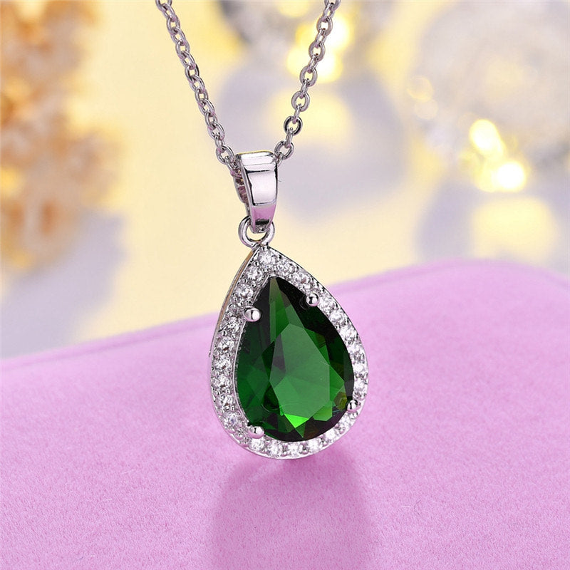 Scentorya Silver Plated Studded With Cubic Zirconia Diamond In Montana Or Emerald Color Stone Chain Pendant