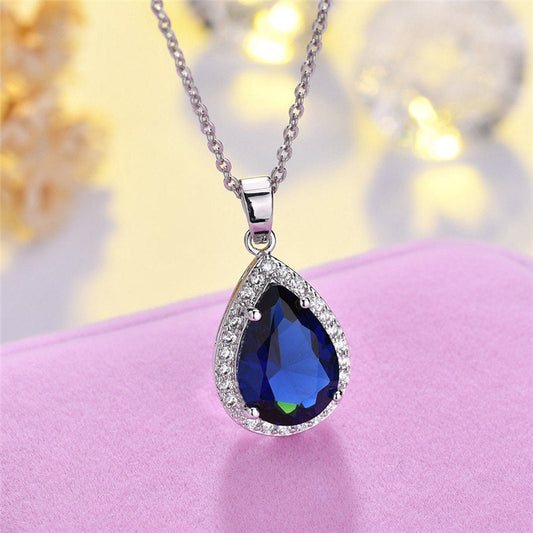 Scentorya Silver Plated Studded With Cubic Zirconia Diamond In Montana Or Emerald Color Stone Chain Pendant